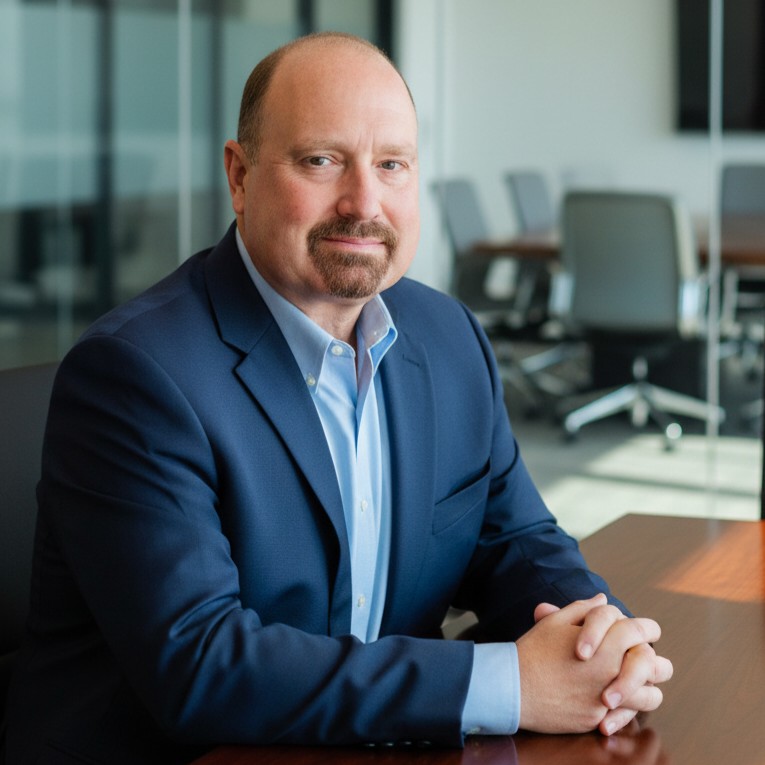A professional headshot of William Wisniewski